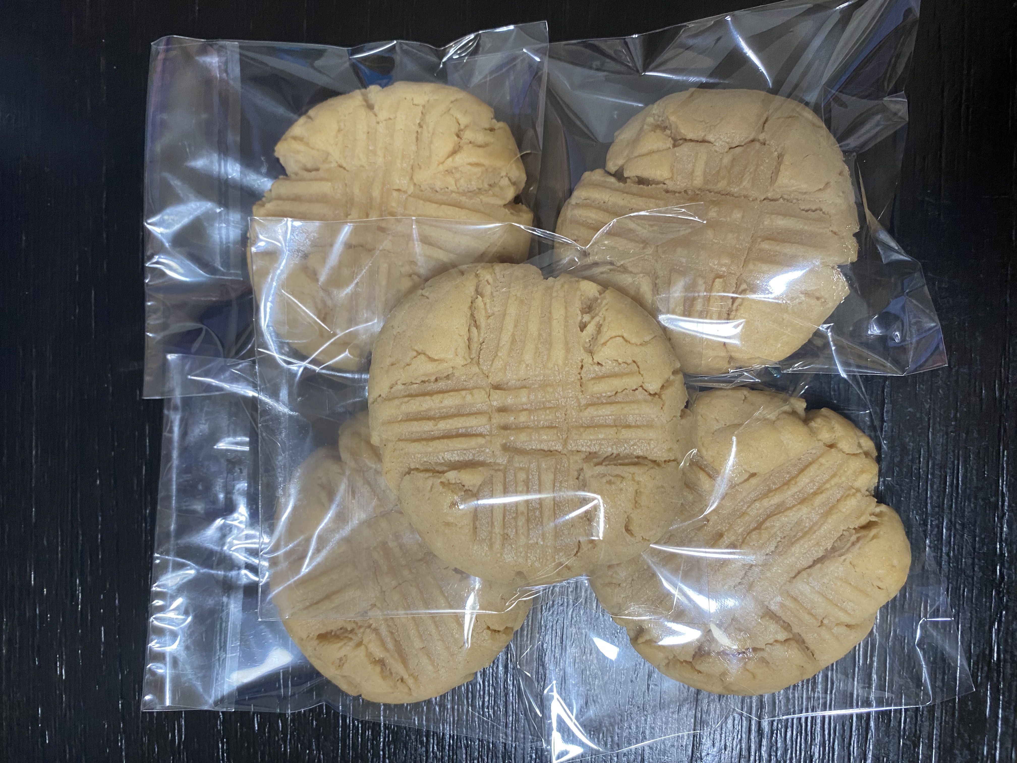 Golden homemade cookies packaged individually